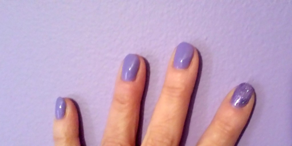 I did not paint my walls to match my nails, or vice-versa, but OPI now has a line of nail color inspired wall paints. Despite this picture, I think that's... an interesting marketing tool. (silly)